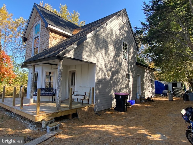 exterior space with a wooden deck