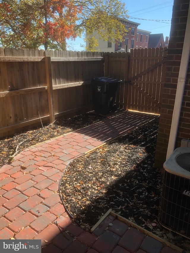 view of patio with cooling unit