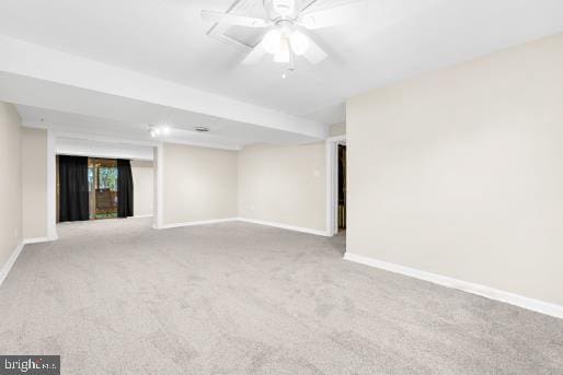 carpeted empty room with ceiling fan