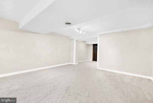 empty room featuring carpet flooring