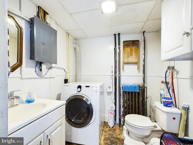 laundry room with washer / dryer, electric panel, and sink