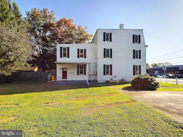 front of property with a front yard