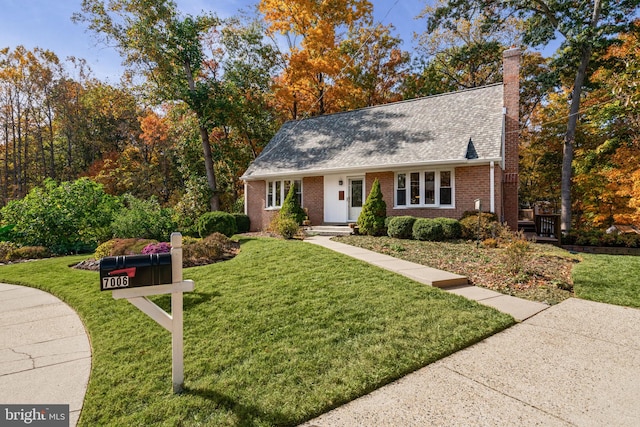 view of front of house with a front lawn