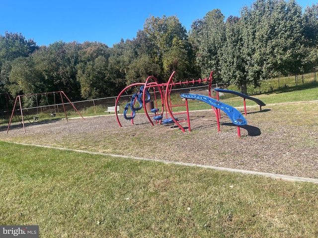 view of jungle gym featuring a yard