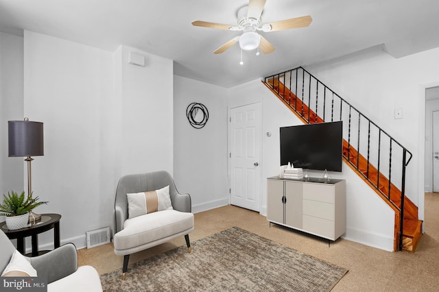 living room with ceiling fan