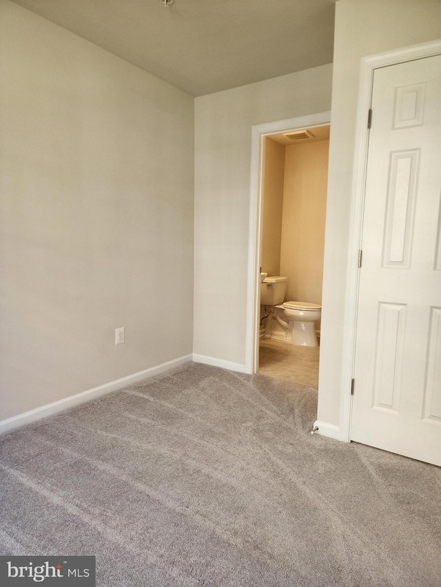 spare room with carpet floors