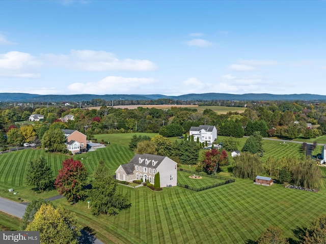 drone / aerial view with a rural view and a mountain view