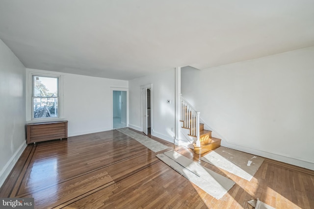 unfurnished room featuring wood-type flooring