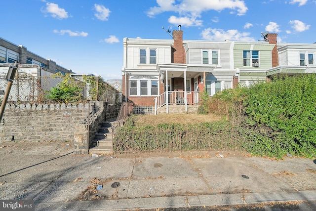 view of property featuring a porch