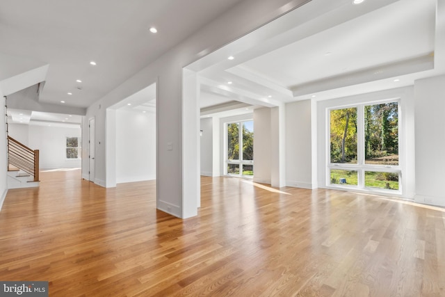4609 Willow Run Dr, Annandale, VA 22003 - unfurnished living room featuring stairs, recessed lighting, light wood-style floors, a raised ceiling, and baseboards