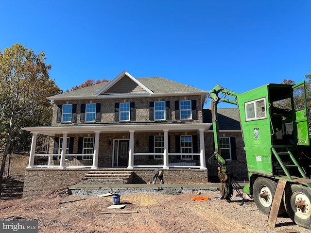 view of front facade featuring covered porch