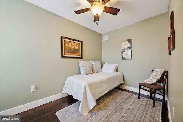 bedroom featuring hardwood / wood-style floors and ceiling fan