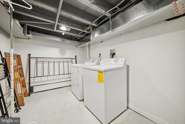 laundry room featuring washing machine and dryer