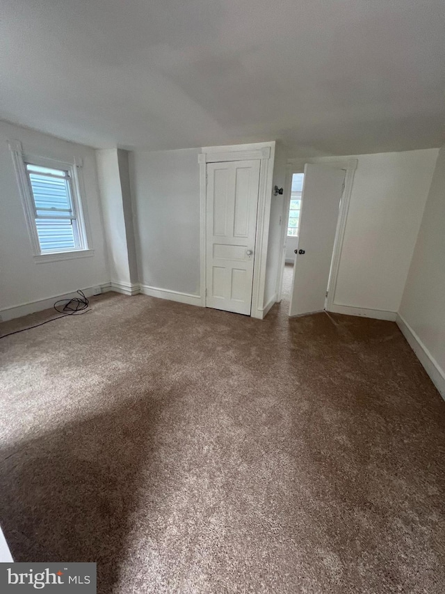 unfurnished room with plenty of natural light