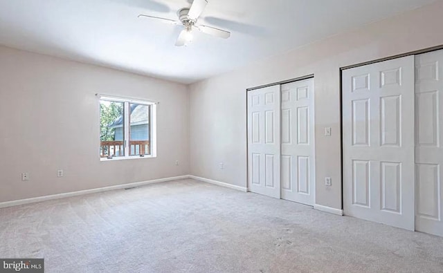 31 S Jersey Ave, Dorothy, NJ 08317 - unfurnished bedroom featuring baseboards, carpet floors, two closets, and ceiling fan
