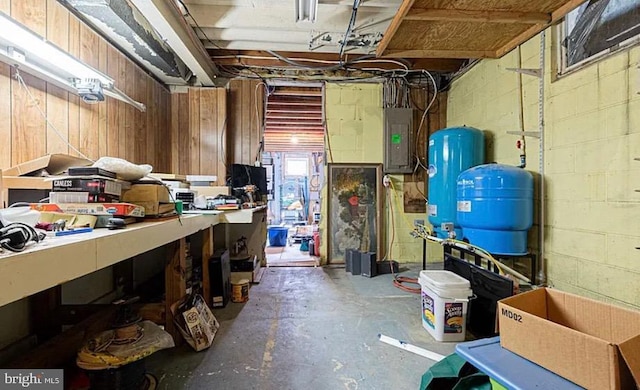 31 S Jersey Ave, Dorothy, NJ 08317 - unfinished below grade area featuring concrete block wall, a workshop area, and electric panel