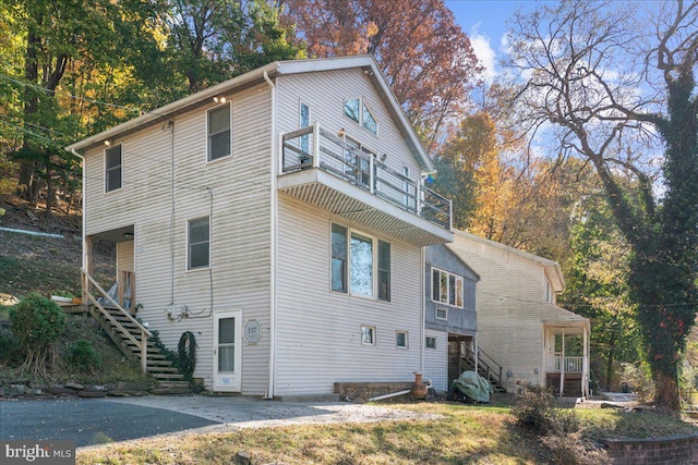 view of home's exterior featuring a balcony