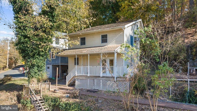 view of front of property featuring covered porch