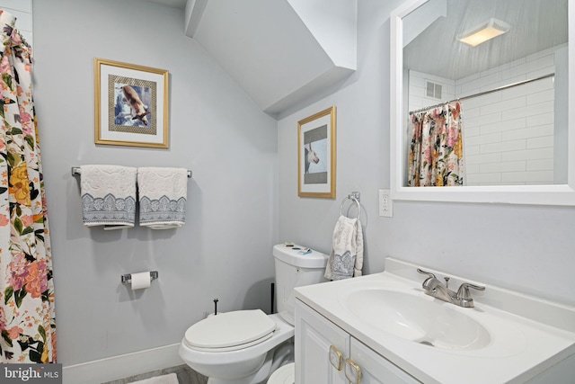 bathroom with vanity, lofted ceiling, a shower with curtain, and toilet