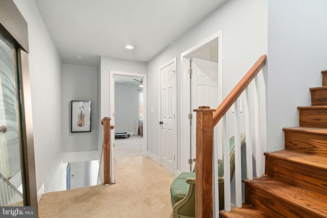 interior space featuring light carpet