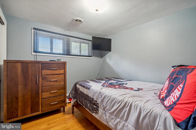 bedroom with light wood-type flooring