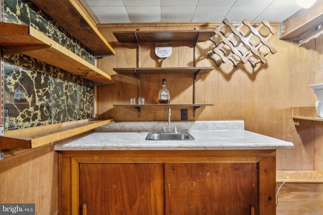 bar with wood walls and sink