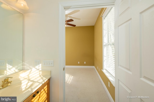 bathroom featuring sink and ceiling fan