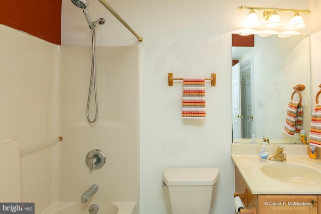 full bathroom with toilet, vanity, and shower / bathing tub combination