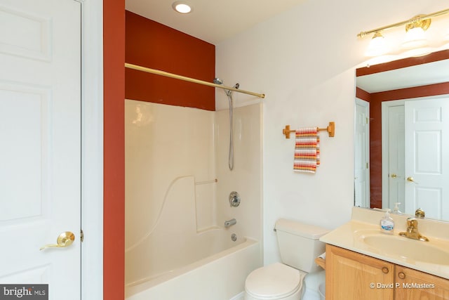 full bathroom featuring vanity, toilet, and washtub / shower combination