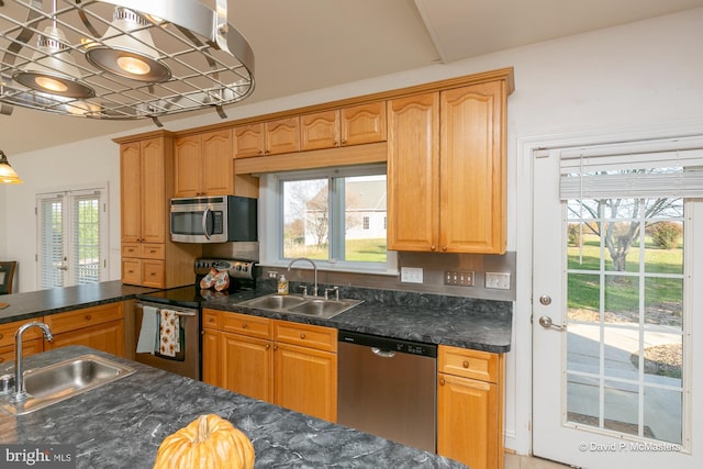 kitchen with sink and appliances with stainless steel finishes