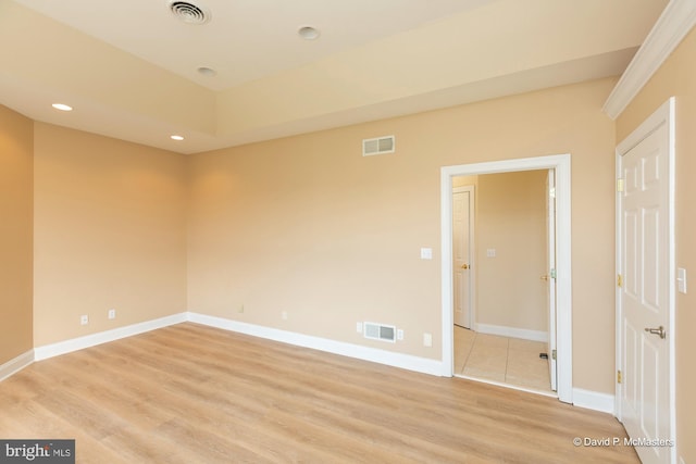 unfurnished room featuring light wood-type flooring