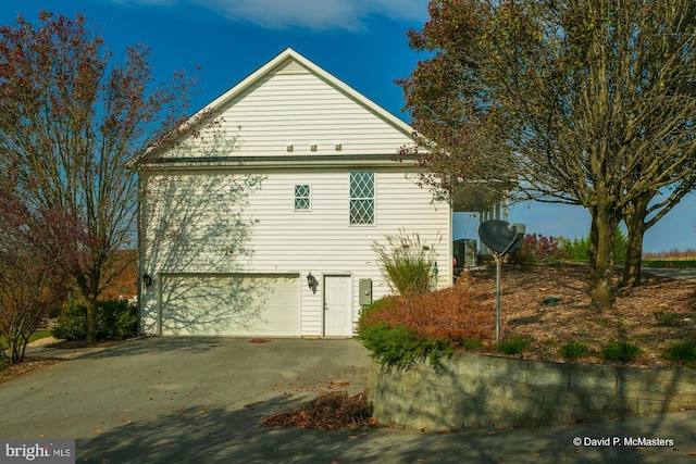 view of home's exterior featuring a garage