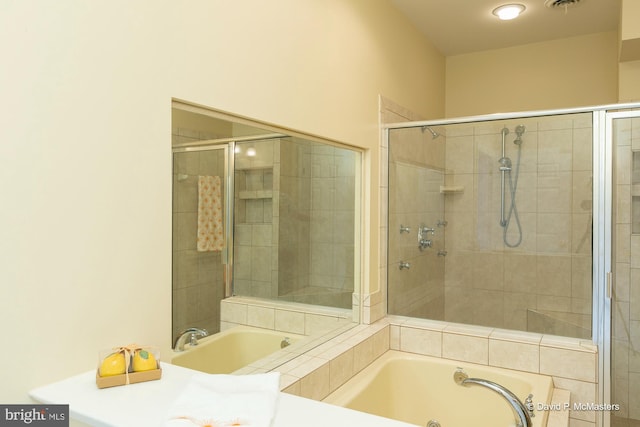 bathroom featuring plus walk in shower