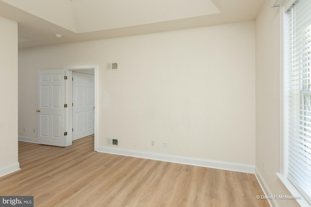 unfurnished room featuring light wood-type flooring