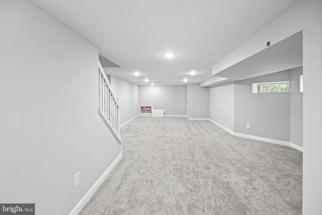 basement featuring carpet