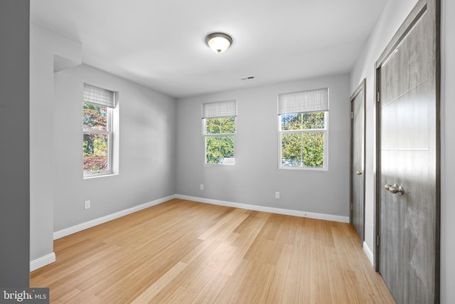 unfurnished bedroom with light hardwood / wood-style floors