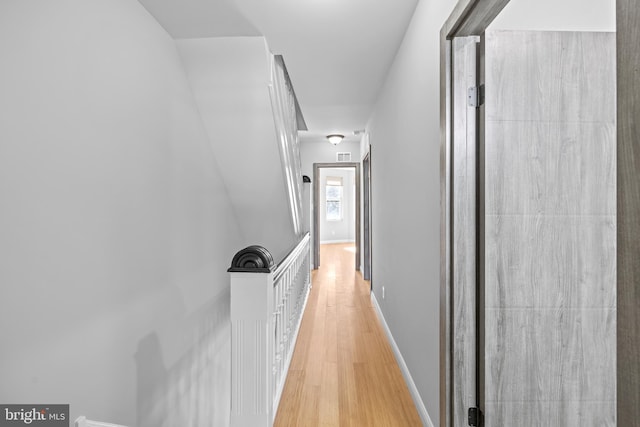 hallway featuring light hardwood / wood-style flooring