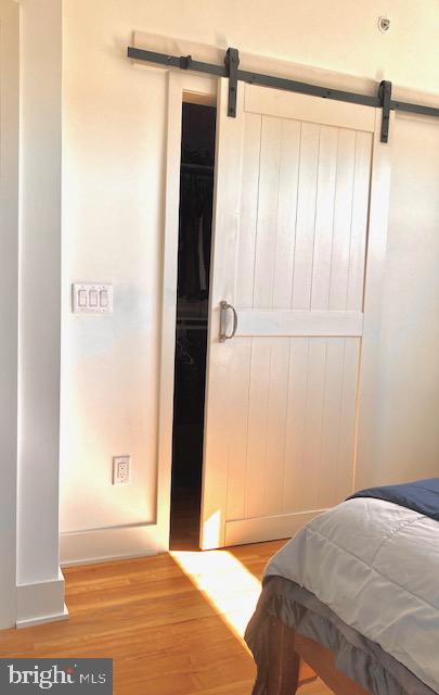 bedroom featuring light wood-type flooring