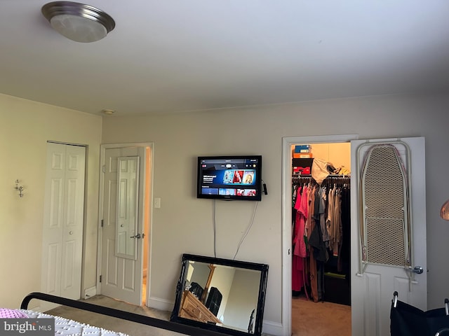 bedroom featuring carpet