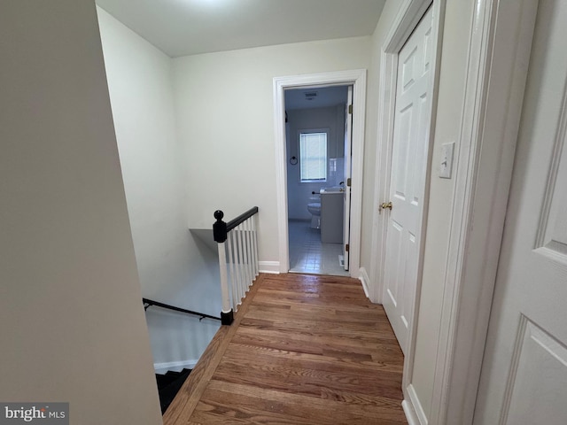 hallway featuring hardwood / wood-style floors