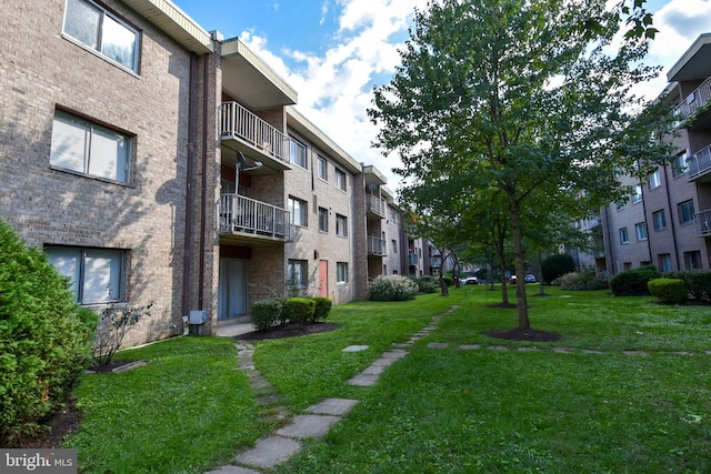 surrounding community featuring a lawn