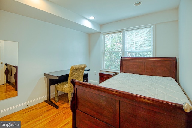 bedroom featuring light hardwood / wood-style floors