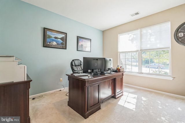 carpeted office space featuring plenty of natural light