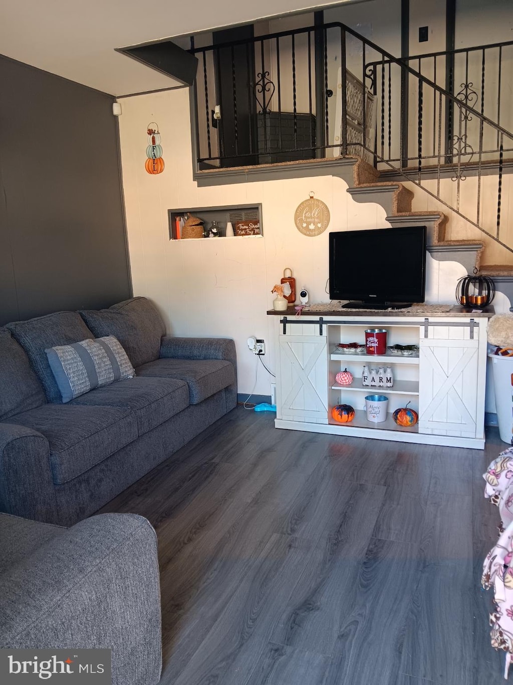 living room with hardwood / wood-style floors