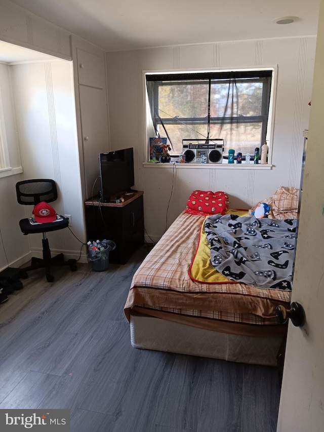 bedroom featuring hardwood / wood-style flooring