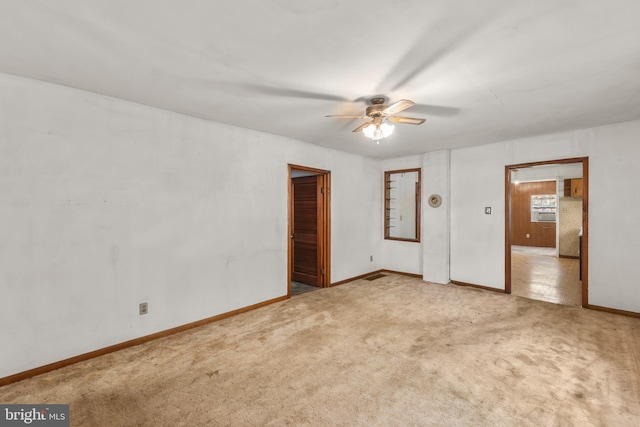 unfurnished bedroom featuring carpet floors, a closet, and ceiling fan