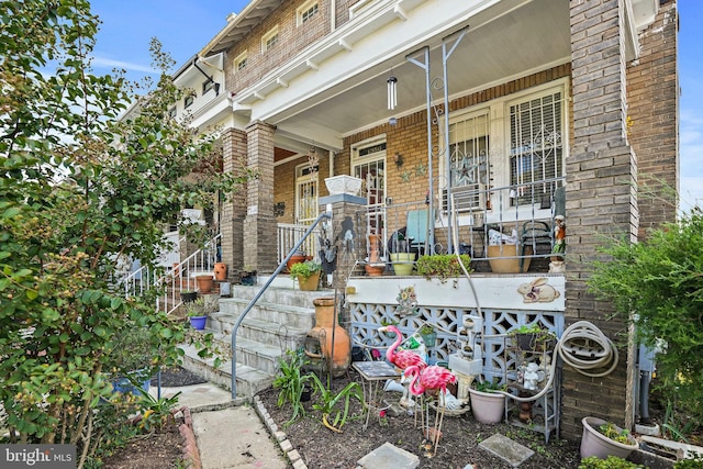 view of patio featuring covered porch