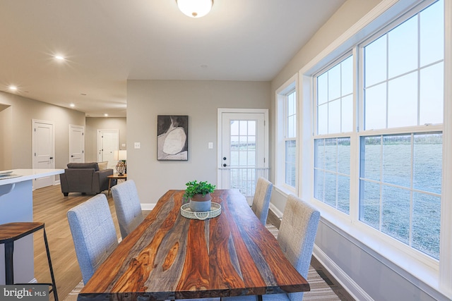 dining area with light wood-type flooring