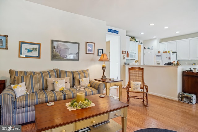 29748 Lyons Dr, Easton, MD 21601 - living area featuring light wood-style flooring and recessed lighting