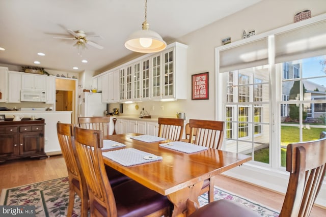 29748 Lyons Dr, Easton, MD 21601 - dining space with light wood finished floors, a ceiling fan, and recessed lighting